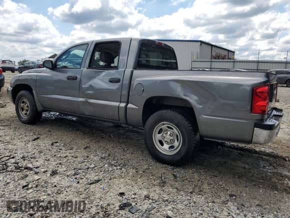 2006 Dodge Dakota SLT с VIN 1D7HE48K06S522552, выставлен на аукционе Copart как лот 67614475 с пробегом 208 801 миль миль и Списание • Salvage title. История ставок и продаж доступна на DreamBid. Изображение 2.
