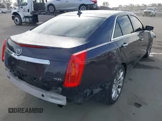✅ 2014 Cadillac CTS Premium RWD • VIN: 1G6AT5S35E0157419 • Lot: 43663559. Listed on IAAI with 74,541 mi. Free auction sales archive from the USA and detailed vehicle history report at DreamBid. Image 4.