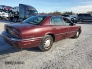 ✅ 1999 Buick Park Avenue • VIN: 1G4CW52K0X4642837 • Lot: 41577875. Listed on Copart with 148,870 mi. Free auction sales archive from the USA and detailed vehicle history report at DreamBid. Image 3.