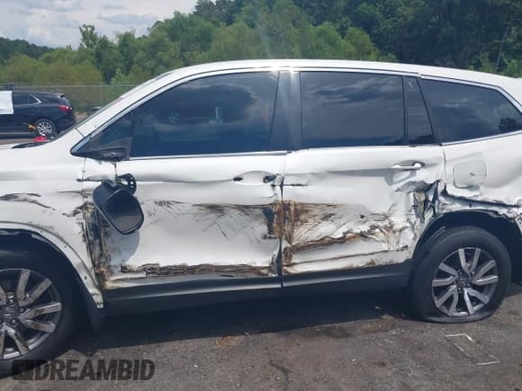 ✅ 2019 Honda Pilot EX-L • VIN: 5FNYF5H51KB008630 • Lot: 42966581. Listed on IAAI with 182,416 mi. Free auction sales archive from the USA and detailed vehicle history report at DreamBid. Image 6.