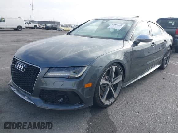 ✅ 2014 Audi RS 7 Prestige • VIN: WUAW2AFC3EN903462 • Lot: 42082052. Wystawiony na IAAI z przebiegiem 78 188 mil. Bezpłatny archiwum sprzedaży aukcyjnych z USA i szczegółowy raport historii pojazdu na DreamBid. Zdjęcie 2.