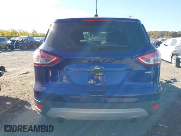 ✅ 2016 Ford Escape SE • VIN: 1FMCU9GX3GUC85624 • Lot: 43541964. Listed on IAAI with 108,826 mi. Free auction sales archive from the USA and detailed vehicle history report at DreamBid. Image 16.