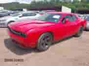 2014 Dodge Challenger SXT 100th Anniversary with VIN 2C3CDYAG0EH285477, listed as a IAAI auction lot 42298675 with 128,684 mi miles and . Bid and sale history available at DreamBid. Image 2.