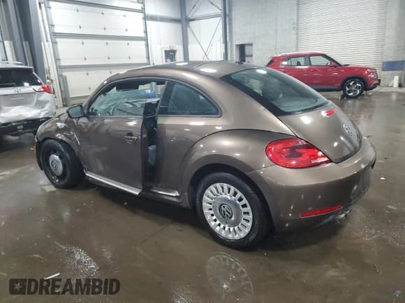 ✅ 2013 Volkswagen Beetle Fender Edition • VIN: 3VWJP7AT9DM679705 • Lot: 44948405. Listed on Copart with 81,190 mi. Free auction sales archive from the USA and detailed vehicle history report at DreamBid. Image 2.