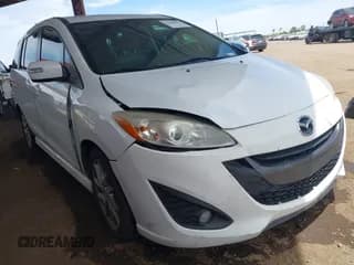 ✅ 2013 Mazda 5 Touring • VIN: JM1CW2CL0D0159894 • Lot: 42386026. Listed on IAAI with 121,879 mi. Free auction sales archive from the USA and detailed vehicle history report at DreamBid. Image 1.