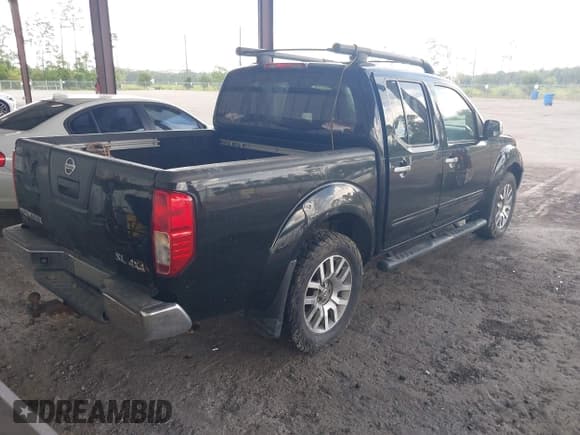✅ 2012 Nissan Frontier Pro-4X • VIN: 1N6AD0EV9CC474476 • Lot: 42776914. Listed on IAAI with 174,312 mi. Free auction sales archive from the USA and detailed vehicle history report at DreamBid. Image 4.
