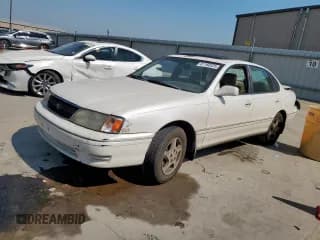 ✅ 1998 Toyota Avalon XL • VIN: 4T1BF18B1WU229710 • Lot: 81160325. Listed on Copart with 276,685 mi. Free auction sales archive from the USA and detailed vehicle history report at DreamBid. Image 1.
