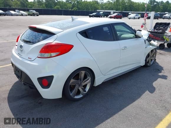 2013 Hyundai Veloster Turbo с VIN KMHTC6AE6DU112233, выставлен на аукционе IAAI как лот 42295962 с пробегом 151 091 миль миль и . История ставок и продаж доступна на DreamBid. Изображение 4.