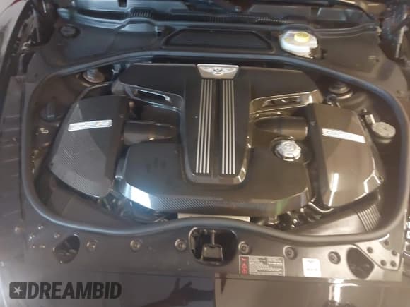 ✅ 2015 Bentley Continental GT • VIN: SCBFS8ZA9FC048427 • Lot: 43642438. Listed on IAAI with 14,022 mi. Free auction sales archive from the USA and detailed vehicle history report at DreamBid. Image 10.