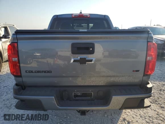 ✅ 2018 Chevrolet Colorado 2WD Z71 • VIN: 1GCGSDEN6J1162263 • Лот: 75697824. Опубликован ранее на Copart с пробегом 39 504 миль. Бесплатный доступ к архиву аукционных продаж из США и подробный отчёт об истории автомобиля на DreamBid. Изображение 6.