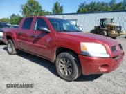 ✅ 2006 Mitsubishi Raider LS • VIN: 1Z7HC28K76S561602 • Лот: 66331085. Опубликован ранее на Copart с пробегом 115 309 миль. Бесплатный доступ к архиву аукционных продаж из США и подробный отчёт об истории автомобиля на DreamBid. Изображение 4.