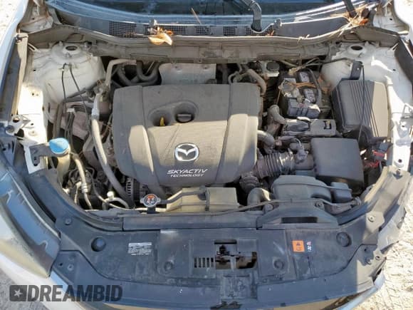 ✅ 2014 Mazda CX-5 Sport • VIN: JM3KE2BE6E0335437 • Lot: 91245865. Listed on Copart with 160,818 mi. Free auction sales archive from the USA and detailed vehicle history report at DreamBid. Image 12.