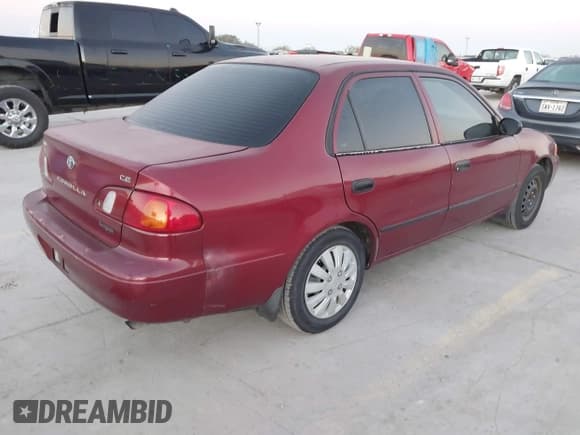 ✅ 2000 Toyota Corolla VE • VIN: 2T1BR12E9YC270164 • Lot: 43479741. Listed on IAAI with 138,128 mi. Free auction sales archive from the USA and detailed vehicle history report at DreamBid. Image 4.