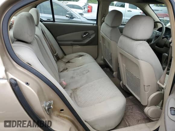 2005 Chevrolet Malibu z VIN 1G1ZS52F25F236985, wystawiony jako Copart lot #69330834 z przebiegiem Nie podano mil oraz Szkoda całkowita • Salvage title. Historia ofert i sprzedaży dostępna na DreamBid. Obrazek 10.