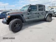 ✅ 2021 Jeep Gladiator Mojave • VIN: 1C6JJTEGXML597632 • Lot: 63629965. Listed on Copart with 41,095 mi. Free auction sales archive from the USA and detailed vehicle history report at DreamBid. Image 1.