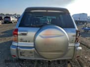 ✅ 2003 Toyota RAV4 • VIN: JTEGH20V830107215 • Лот: 94493765. Опубликован ранее на Copart с пробегом 252 429 миль. Бесплатный доступ к архиву аукционных продаж из США и подробный отчёт об истории автомобиля на DreamBid. Изображение 6.