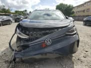 ✅ 2023 Volkswagen ID.4 S • VIN: 1V25MPE85PC050451 • Лот: 85138155. Опубликован ранее на Copart с пробегом 19 729 миль. Бесплатный доступ к архиву аукционных продаж из США и подробный отчёт об истории автомобиля на DreamBid. Изображение 5.