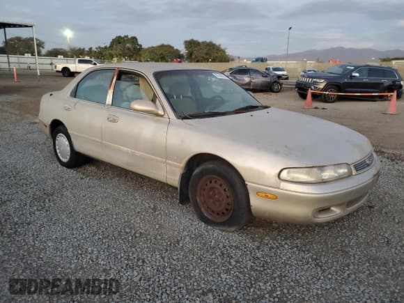 ✅ 1994 Mazda 626 DX • VIN: 1YVGE22C5R5160503 • Lot: 87448214. Wystawiony na Copart z przebiegiem 70 575 mil. Bezpłatny archiwum sprzedaży aukcyjnych z USA i szczegółowy raport historii pojazdu na DreamBid. Zdjęcie 4.