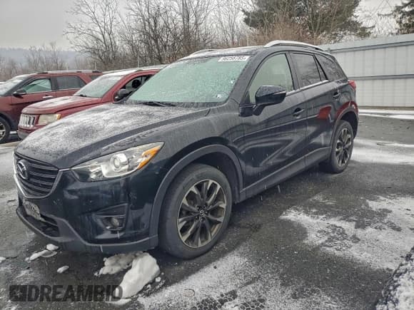 ✅ 2016 Mazda CX-5 Grand Touring • VIN: JM3KE4DY9G0886287 • Lot: 96258785. Wystawiony na Copart z przebiegiem 136 186 mil. Bezpłatny archiwum sprzedaży aukcyjnych z USA i szczegółowy raport historii pojazdu na DreamBid. Zdjęcie 1.