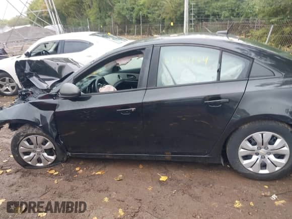 2014 Chevrolet Cruze LS z VIN 1G1PA5SH1E7336369, wystawiony jako IAAI lot #43311124 z przebiegiem 101 303 mil mil oraz . Historia ofert i sprzedaży dostępna na DreamBid. Obrazek 15.