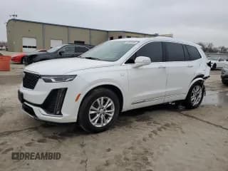 ✅ 2024 Cadillac XT6 FWD Luxury • VIN: 1GYKPAR47RZ720446 • Lot: 43964105. Listed on Copart with 10,728 mi. Free auction sales archive from the USA and detailed vehicle history report at DreamBid. Image 1.