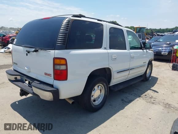 ✅ 2003 GMC Yukon SLT • VIN: 1GKEC13Z13J337471 • Lot: 42791477. Listed on IAAI with 222,140 mi. Free auction sales archive from the USA and detailed vehicle history report at DreamBid. Image 4.