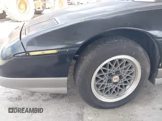 ✅ 1987 Pontiac Fiero GT • VIN: 1G2PG1192HP229428 • Lot: 42908823. Wystawiony na IAAI z przebiegiem 76 284 mil. Bezpłatny archiwum sprzedaży aukcyjnych z USA i szczegółowy raport historii pojazdu na DreamBid. Zdjęcie 6.