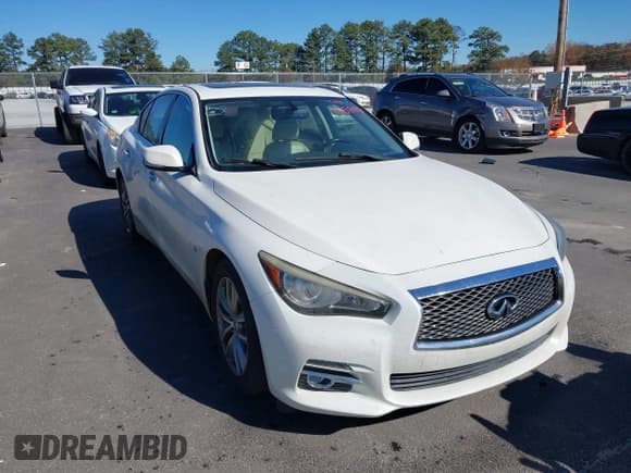✅ 2014 Infiniti Q50 Premium • VIN: JN1BV7AP6EM684263 • Lot: 43658446. Listed on IAAI with 123,849 mi. Free auction sales archive from the USA and detailed vehicle history report at DreamBid. Image 1.
