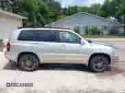 2006 Toyota Highlander z VIN JTEGD21AX60139594, wystawiony jako IAAI lot #42473393 z przebiegiem 210 409 mil mil oraz . Historia ofert i sprzedaży dostępna na DreamBid. Obrazek 13.