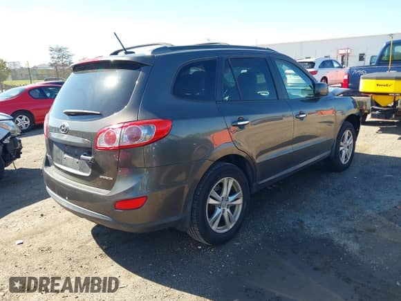 2012 Hyundai Santa Fe Limited with VIN 5XYZKDAG9CG120382, listed as a IAAI auction lot 43416587 with 205,312 mi miles and . Bid and sale history available at DreamBid. Image 4.