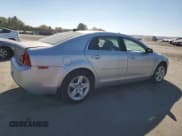 ✅ 2012 Chevrolet Malibu 1LS • VIN: 1G1ZB5E02CF217793 • Lot: 76805354. Listed on Copart with 46,364 mi. Free auction sales archive from the USA and detailed vehicle history report at DreamBid. Image 3.