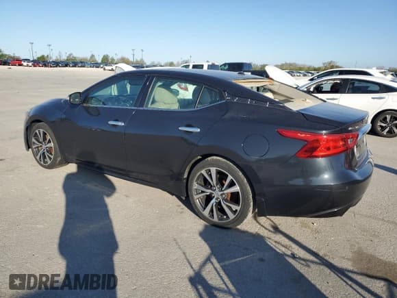 ✅ 2017 Nissan Maxima S • VIN: 1N4AA6AP4HC365801 • Lot: 52754195. Listed on Copart with 141,033 mi. Free auction sales archive from the USA and detailed vehicle history report at DreamBid. Image 2.