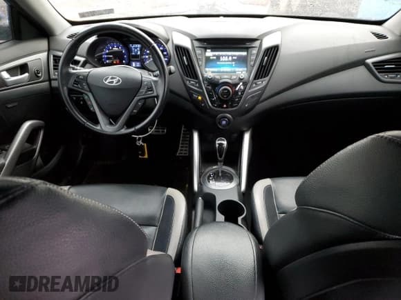 ✅ 2015 Hyundai Veloster Turbo • VIN: KMHTC6AE7FU222985 • Lot: 81516214. Listed on Copart with 67,979 mi. Free auction sales archive from the USA and detailed vehicle history report at DreamBid. Image 8.