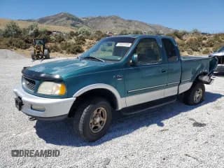 ✅ 1998 Ford F-150 • VIN: 1FTRX18L9WKB08296 • Lot: 64687265. Listed on Copart with 240,607 mi. Free auction sales archive from the USA and detailed vehicle history report at DreamBid. Image 1.