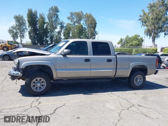 ✅ 2003 GMC Sierra 2500HD SLT • VIN: 1GTHK231X3F243264 • Лот: 42606442. Опубликован ранее на IAAI с пробегом 166 770 миль. Бесплатный доступ к архиву аукционных продаж из США и подробный отчёт об истории автомобиля на DreamBid. Изображение 14.