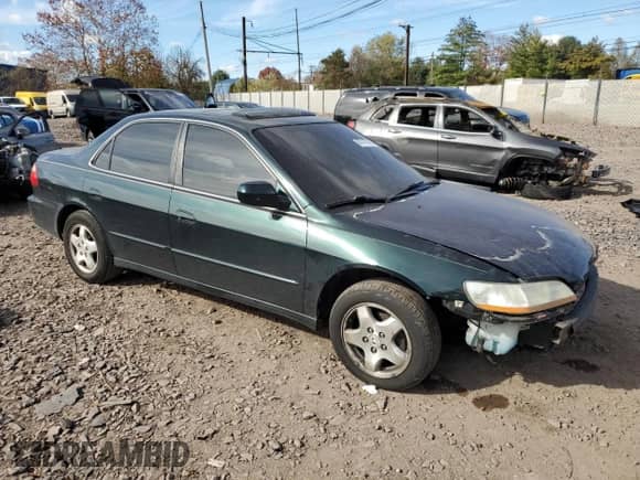 2000 Honda Accord EX с VIN 1HGCG1652YA084041, выставлен на аукционе Copart как лот 90147245 с пробегом 143 776 миль миль и Списание • Salvage title. История ставок и продаж доступна на DreamBid. Изображение 4.