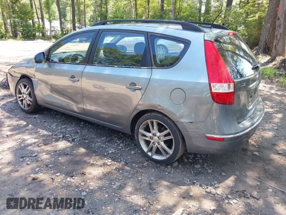 2010 Hyundai Elantra GLS z VIN KMHDC8AE3AU050785, wystawiony jako IAAI lot #42546854 z przebiegiem 72 198 mil mil oraz . Historia ofert i sprzedaży dostępna na DreamBid. Obrazek 3.