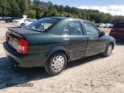 ✅ 1999 Mazda Protege DX • VIN: JM1BJ2226X0182555 • Lot: 71795515. Wystawiony na Copart z przebiegiem 199 035 mil. Bezpłatny archiwum sprzedaży aukcyjnych z USA i szczegółowy raport historii pojazdu na DreamBid. Zdjęcie 3.