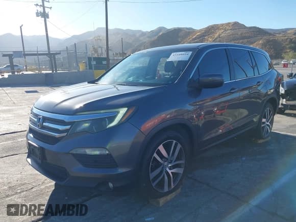 ✅ 2017 Honda Pilot EX-L • VIN: 5FNYF5H55HB017064 • Lot: 43348054. Listed on IAAI with 152,893 mi. Free auction sales archive from the USA and detailed vehicle history report at DreamBid. Image 18.
