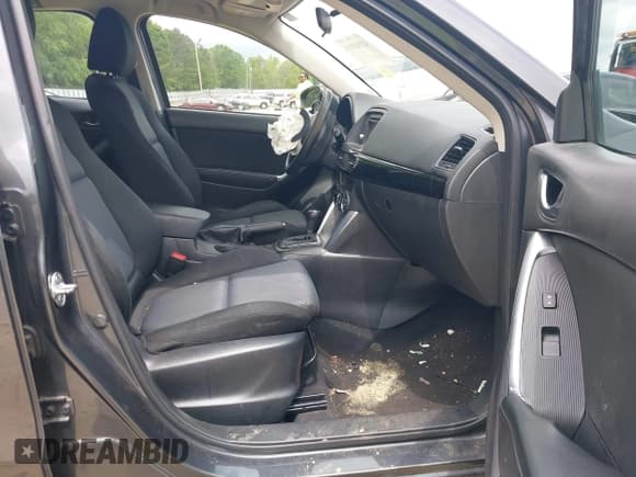 ✅ 2014 Mazda CX-5 Sport • VIN: JM3KE2BE5E0350057 • Lot: 42145910. Listed on IAAI with 157,517 mi. Free auction sales archive from the USA and detailed vehicle history report at DreamBid. Image 5.