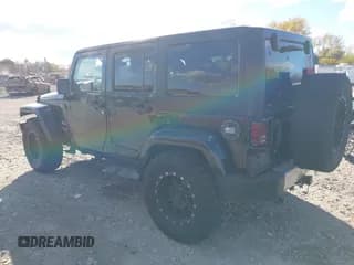 ✅ 2011 Jeep Wrangler Unlimited Sahara • VIN: 1J4BA5H13BL517031 • Лот: 43580365. Опубликован ранее на IAAI с пробегом Не указан. Бесплатный доступ к архиву аукционных продаж из США и подробный отчёт об истории автомобиля на DreamBid. Изображение 3.