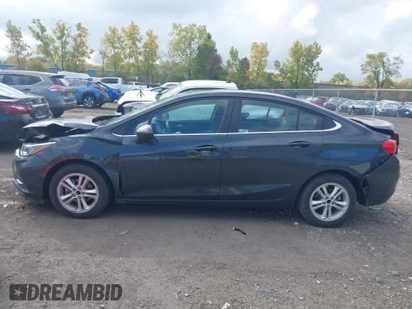 ✅ 2018 Chevrolet Cruze LT • VIN: 1G1BE5SM0J7209778 • Лот: 43290097. Опубликован ранее на IAAI с пробегом 47 625 миль. Бесплатный доступ к архиву аукционных продаж из США и подробный отчёт об истории автомобиля на DreamBid. Изображение 14.
