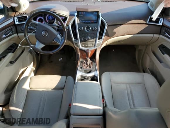 ✅ 2012 Cadillac SRX Luxury Collection • VIN: 3GYFNDE35CS526668 • Лот: 62813945. Опубликован ранее на Copart с пробегом 123 844 миль. Бесплатный доступ к архиву аукционных продаж из США и подробный отчёт об истории автомобиля на DreamBid. Изображение 8.