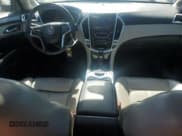 ✅ 2014 Cadillac SRX Luxury Collection • VIN: 3GYFNBE32ES609935 • Лот: 82520005. Опубликован ранее на Copart с пробегом 102 310 миль. Бесплатный доступ к архиву аукционных продаж из США и подробный отчёт об истории автомобиля на DreamBid. Изображение 8.