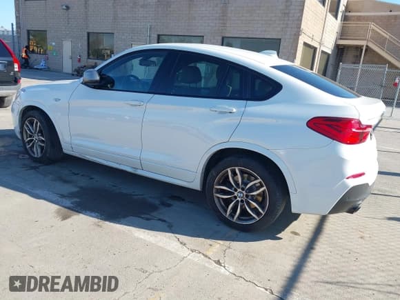 ✅ 2017 BMW X4 M40i • VIN: 5UXXW7C59H0U25191 • Lot: 41867852. Listed on IAAI with 76,301 mi. Free auction sales archive from the USA and detailed vehicle history report at DreamBid. Image 3.