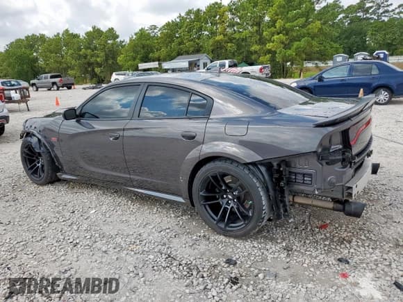 ✅ 2023 Dodge Charger Scat Pack • VIN: 2C3CDXGJ2PH702131 • Лот: 70379055. Опубликован ранее на Copart с пробегом 11 889 миль. Бесплатный доступ к архиву аукционных продаж из США и подробный отчёт об истории автомобиля на DreamBid. Изображение 2.