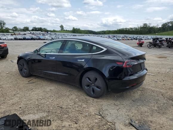 ✅ 2019 Tesla Model 3 Mid Range • VIN: 5YJ3E1EA1KF409991 • Лот: 59198445. Опубликован ранее на Copart с пробегом 69 535 миль. Бесплатный доступ к архиву аукционных продаж из США и подробный отчёт об истории автомобиля на DreamBid. Изображение 2.