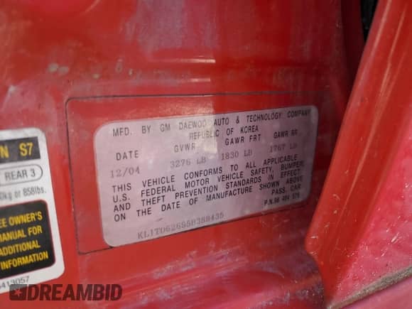 2005 Chevrolet Aveo LS z VIN KL1TD62695B388435, wystawiony jako Copart lot #67541114 z przebiegiem 95 156 mil mil oraz Czysty tytuł • Clean title. Historia ofert i sprzedaży dostępna na DreamBid. Obrazek 12.