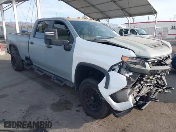 2020 Chevrolet Silverado 2500HD Work Truck z VIN 1GC1YLEY3LF274761, wystawiony jako IAAI lot #40893959 z przebiegiem 191 742 mil mil oraz . Historia ofert i sprzedaży dostępna na DreamBid. Obrazek 1.
