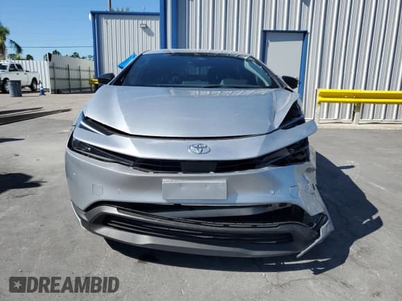 ✅ 2024 Toyota Prius LE • VIN: JTDACAAUXR3046093 • Lot: 90372365. Wystawiony na Copart z przebiegiem 15 281 mil. Bezpłatny archiwum sprzedaży aukcyjnych z USA i szczegółowy raport historii pojazdu na DreamBid. Zdjęcie 5.